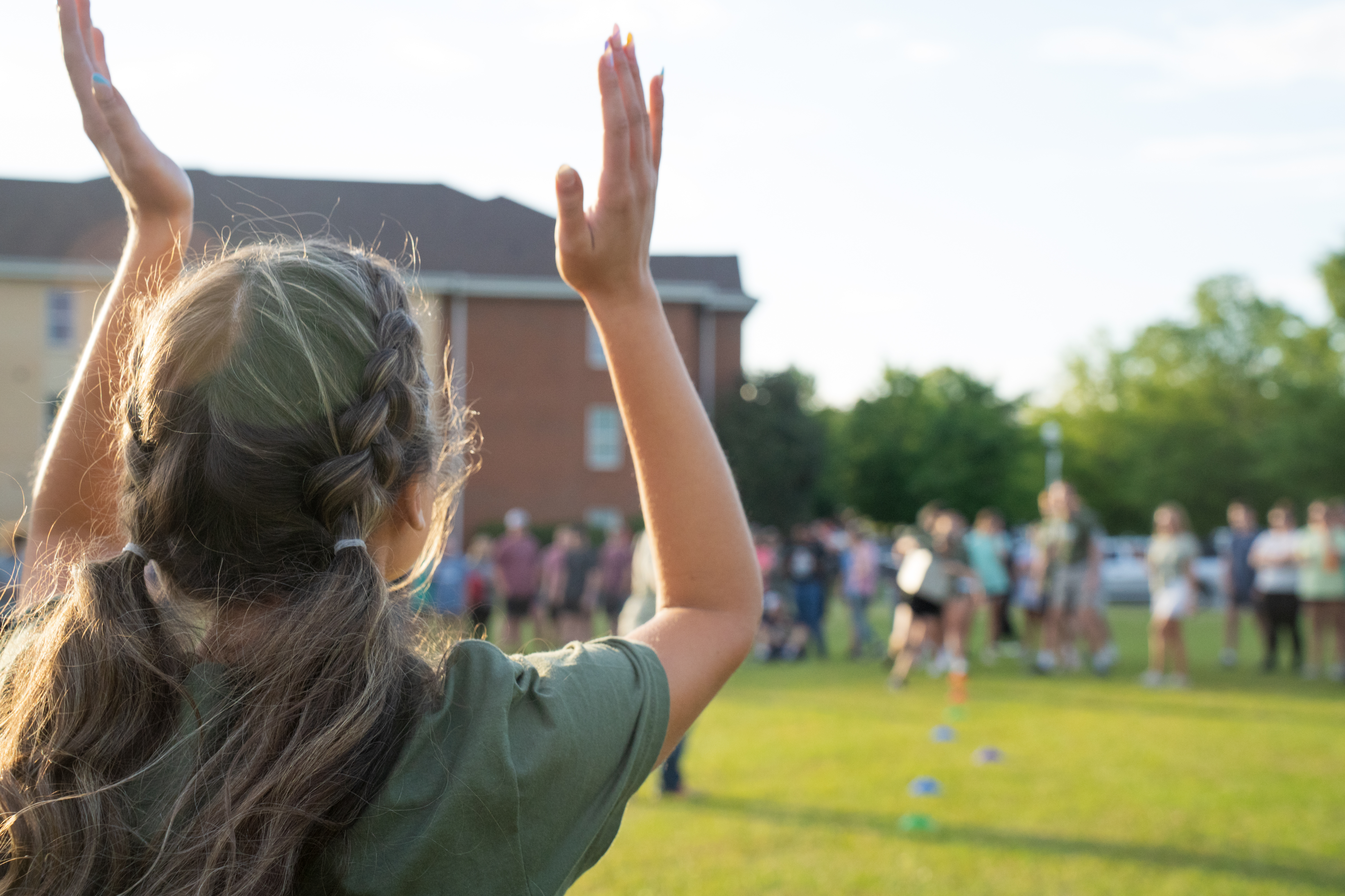 student at club event