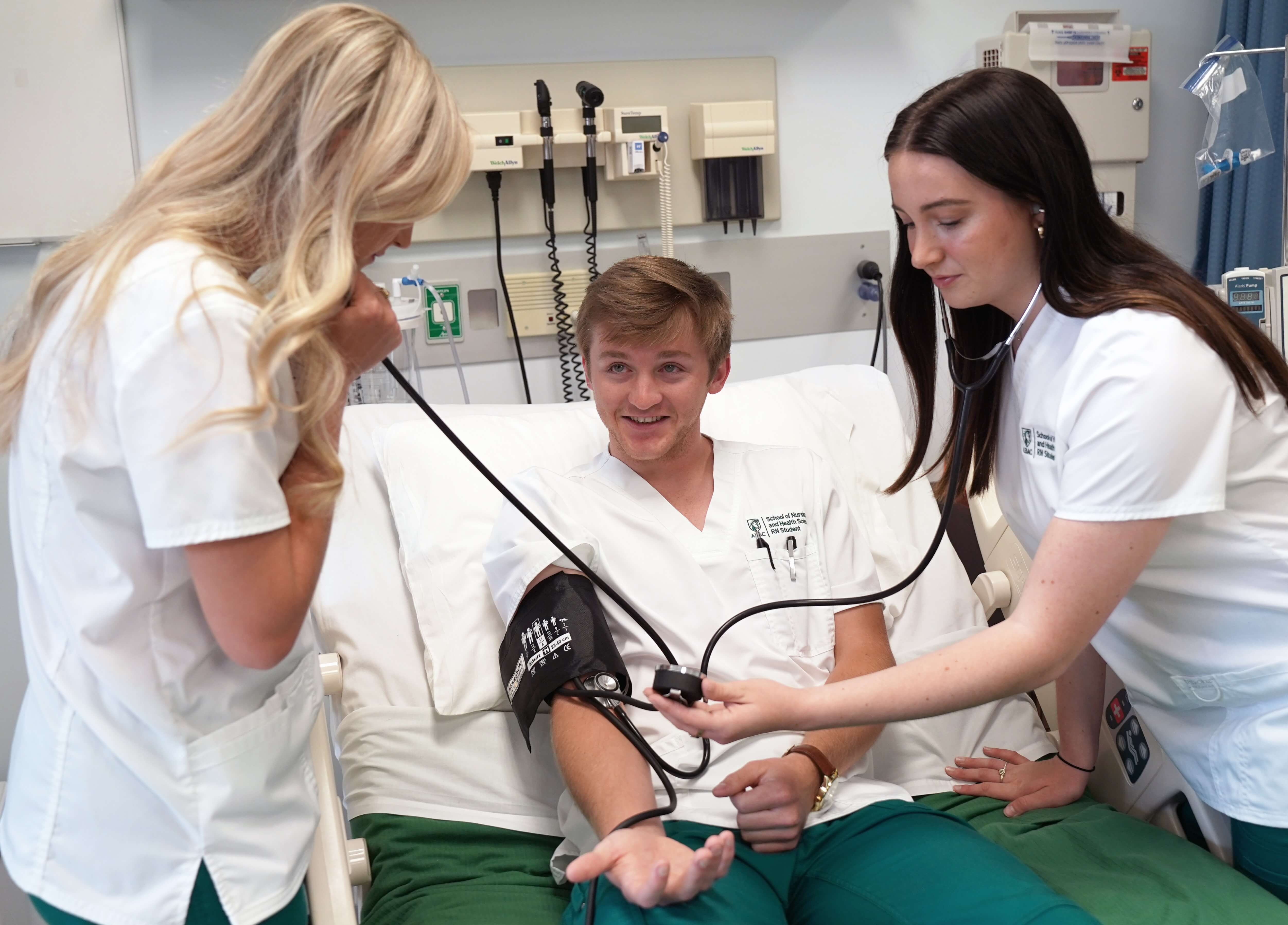 nursing students in a lab setting