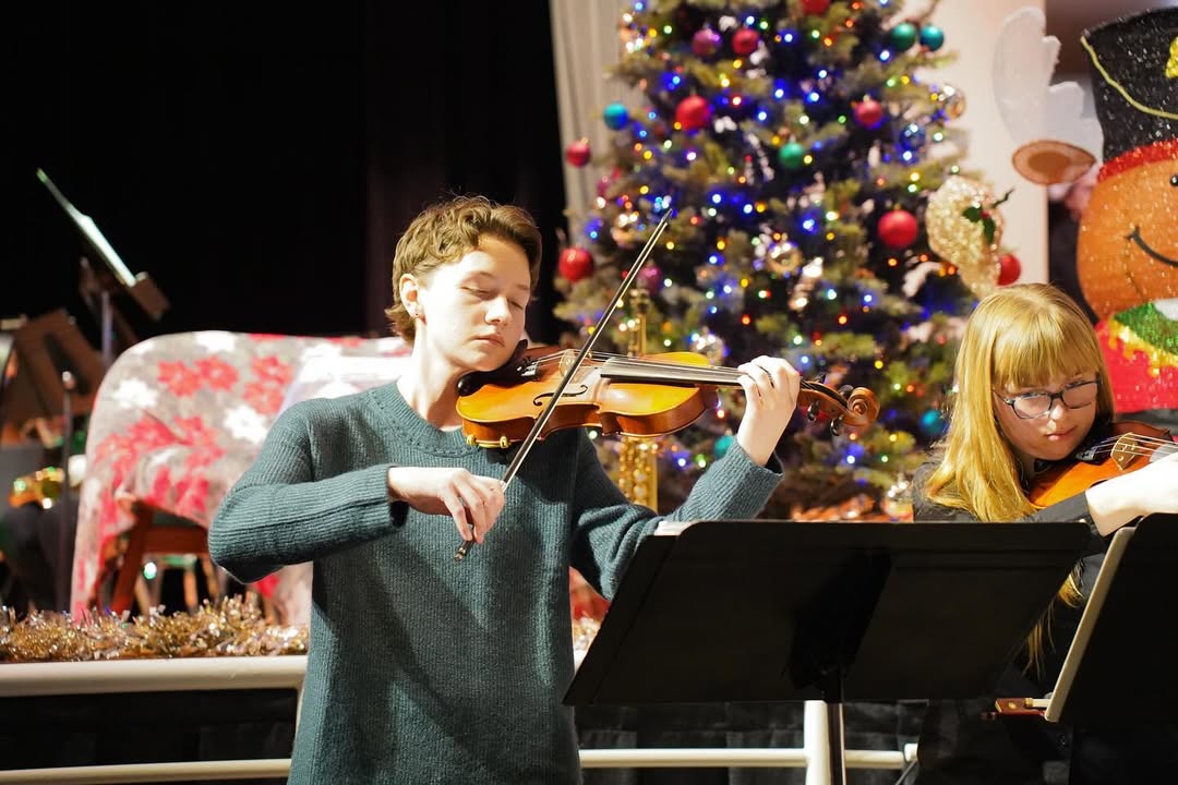 student playing violin