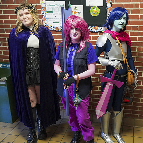 students in costume on campus