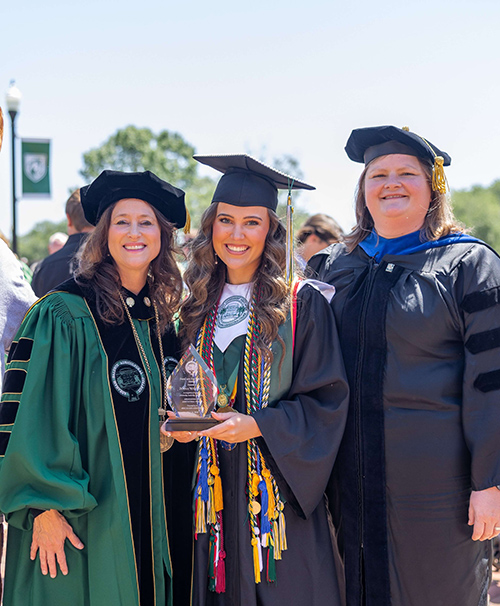 From left to right: ABAC President Tracy Brundage, Jenna Williams and Vice President of the ABAC Alumni Association Carrie Crabtree at the spring 2026 commencement ceremony.